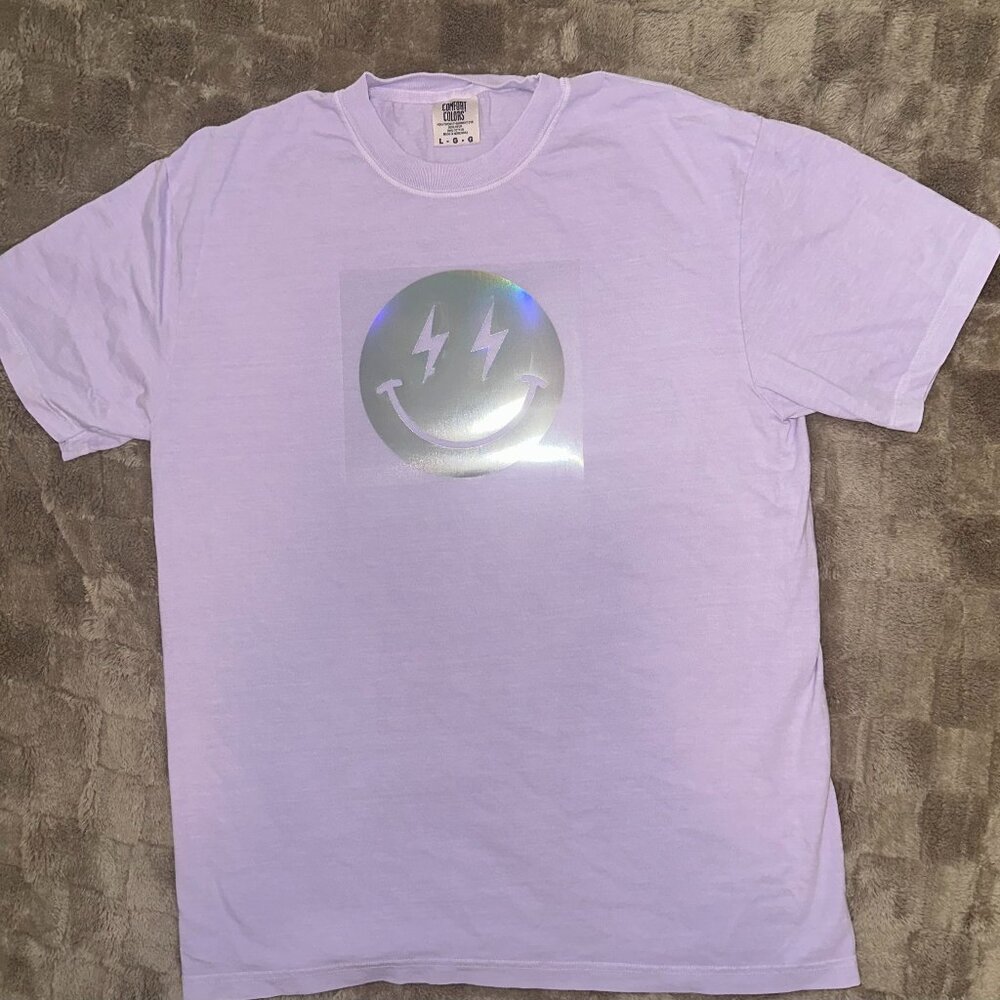 Comfort Color Tee In ORCHID Features the cutest Happy Face Holographic